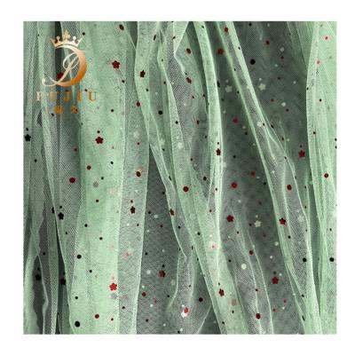 China Lovely Breathable Pale Green Stars Tulle Mesh Fabric Kids Borders Sequin Fabric For Dresses for sale