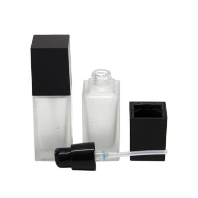 China 30ml 40ml square bb base packaging pump glass bottles luxury cosmetic luxury frosted cream liquid empty bottle for sale