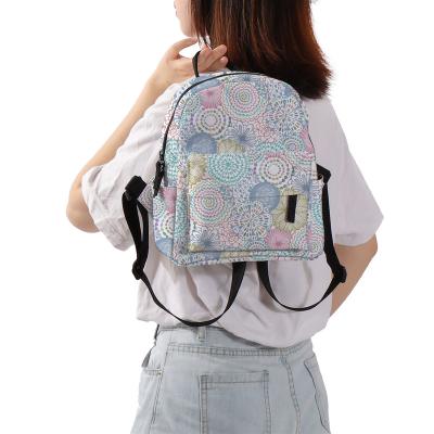 China New Customized Waterproof Pink School Bag Blue And Green Flower Printed Waterproof Schoolbag Backpack for sale