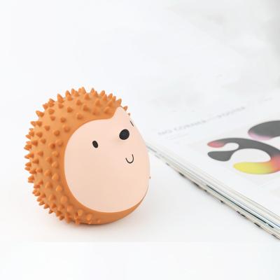 China Hedgehog Body Vibration Deep Heated Massager Roller Portable Battery Hand Warmer for sale