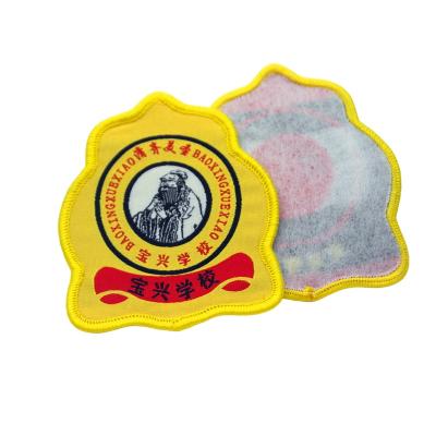 China Sustainable Custom Iron On Woven Sublimation Patches Woven Badge For Apparel Garment Hats Bags for sale