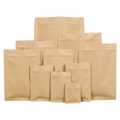 China Recyclable Stand Up Paper Custom Kraft Paper Bag With Window Paper Bags Kraft Paper Clear Aluminum Foil Coated Paper Bag for sale