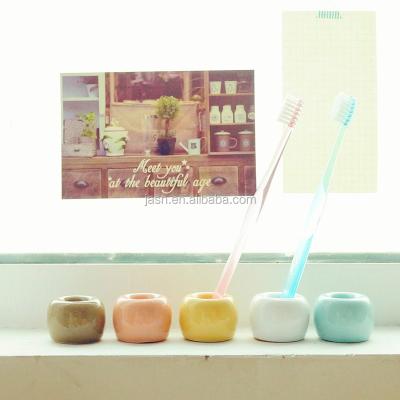 China Sustainable Fashinon Ceramic Bathroom Accessory Single Toothbrush Holder for sale