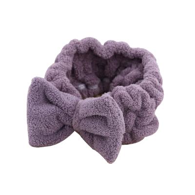 China Coral Fleece Women Bowknot Shower Soft Elastic Headband Bath Towel for sale