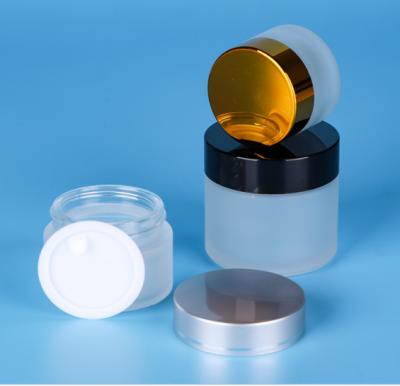 China Cosmetic frosted glass cosmetic bottle container with aluminum metal cover for cream, emulsion and balm. for sale