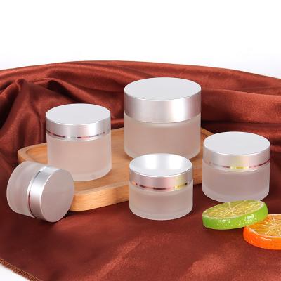 China High Quantity 50ml 30ml Personal Care Cream Bottle Frosted Glass Jar Cosmetic Skin Care Packaging With Lid for sale