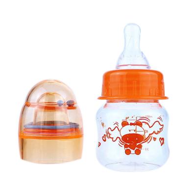 China 2oz 60ML BPA Food Grade pp/pc BPA Free Mini Newborn Baby Milk Bottle Funny Plastic Free Feeding Bottle 2oz 60ML With Rattles for sale