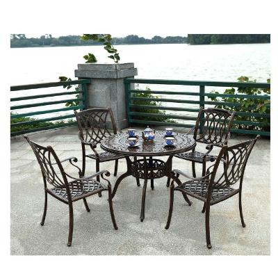 China Customized luxury mid century modern metal dining tables and chairs are suitable for outdoor courtyard villa dining tables and chairs for sale