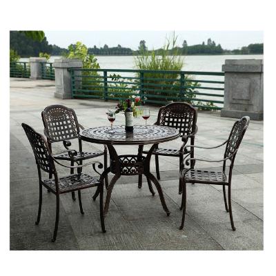 China Mid-Century Restaurant Garden Tables And Chairs Modern Outdoor Patio Dining Table Patio Furniture Set Customization for sale