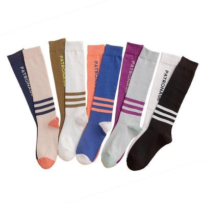 China QUICK DRY manufacturers wholesale colorful high sock girls stripe high long knee socks for sale