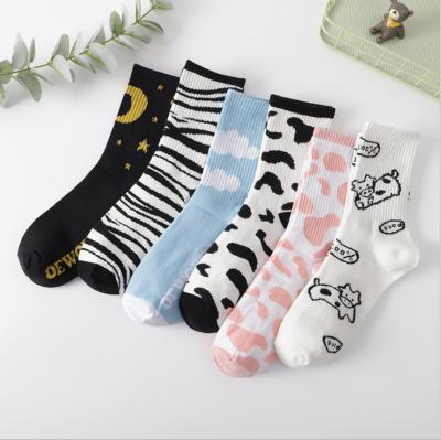 China New QUICK DRY stocking sock winter autumn couples socks women's cartoon milk cow style tube socks lovely for sale