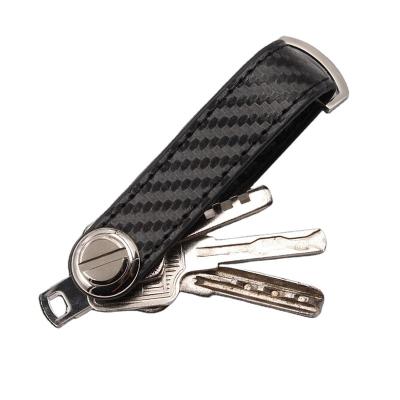 China Customized Carbon Fiber Smart Compact Key Pocket Holder Organizer Leather Key Chain for up to 10 Keys for sale