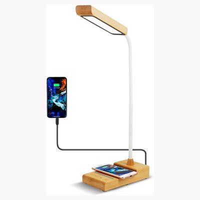 China Smart Touch/Auto Timing/Storage/360 Adjustment 360 Degree Adjustable Wireless Mobile Charging for Bedroom Led Smart Wood Base Table Lamp Wood Desk Light for sale