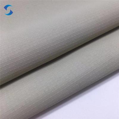 China 100% Polyester Shrink-Resistant Jacquard Pongee Fabric Textile For Garment Pongee Lining Fabric Winter Jacket for sale