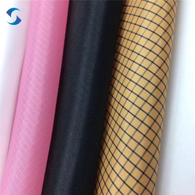 China 190T 210T waterproof taffeta ripstop PU coated polyester taffeta fabric for sale