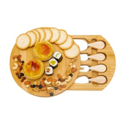 China 100% Natural Cheese Sustainable Bamboo Board With 3 Piece Cutlery Set Cheese Tray Hidden Cutlery Drawer for sale