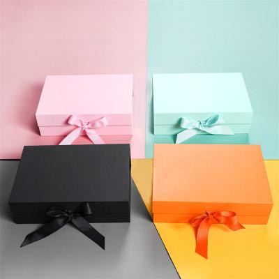 China Recyclable/Eco-friendly Hot Selling Magnetic Folding Paper Wedding Gift Box Paper Box Packaging Cardboard Gift Box Packaging With Ribbon for sale