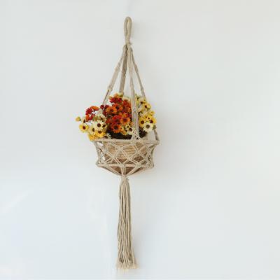 China Handmade Europe Macrame Wall Hanging Flower Pot Holder Macrame Plant Hangers Shelf For Home Decoration for sale