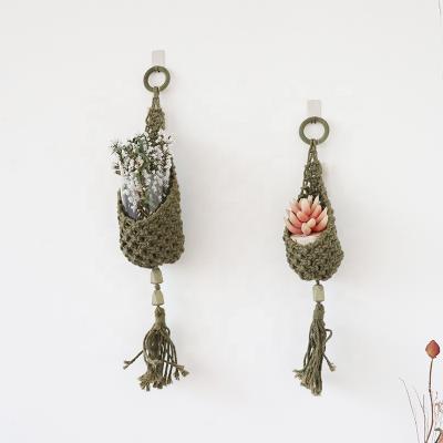 China Hot Selling Macrame Flower Pot Clamp Plant Handmade Wall Hanger Storage Bag Indoor Outdoor Wall Decor for sale