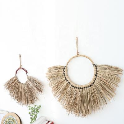 China Minimalist popular handmade grass wall hanger for home decoration for sale