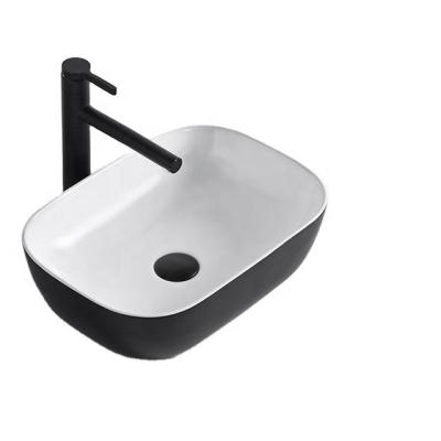 China 1280 Degree Sustainable Temperature Porcelain Black Ceramic Bathroom Cabinet Basin for sale