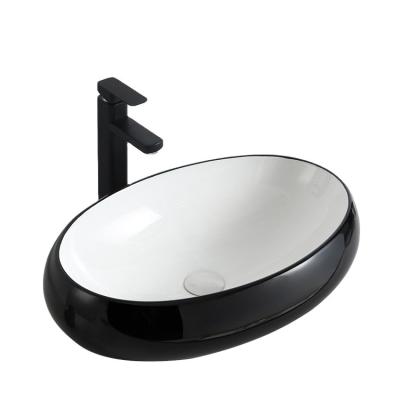 China Sustainable Bathroom Toilet Sink Luxury Design Ceramic Black Hand Basin for sale