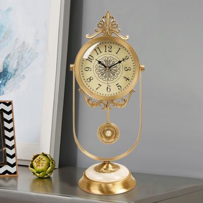 China Contemporary Modern Style Luxury Bronze Clock Table Decor For Home Decoration for sale