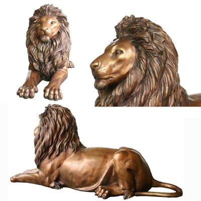 China Europe Life Size Bronze Metal Garden Sculpture Lion Statue Lying On Ground for sale