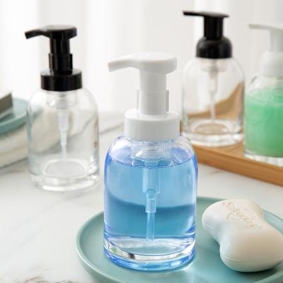 China New Round Glass Personal Care Hand Sanitizer Bottle Under, 250ml Hand Foam Liquid Soap Pump Wash Bottle for sale