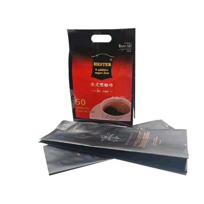 China 2023 Customized Black Plastic Handle Coffee Side Gusset Patch Aluminum Foil Moisture Proof Packaging Bags for sale