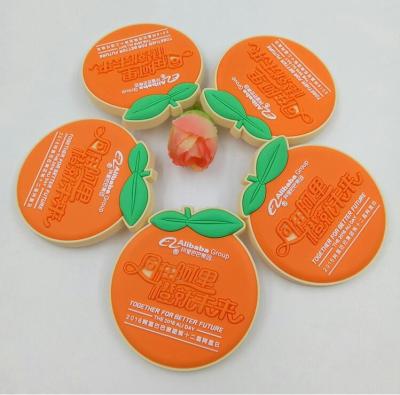 China Custom Orange Shape Embossed Rubber Soft PVC Badges With Safety Pins For Alibaba 12th Birthday for sale