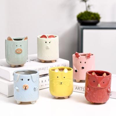 China 2022 CLASSIC 6 hot sale small animal ceramic pottery planter green plant flower pot painted indoor decor for sale