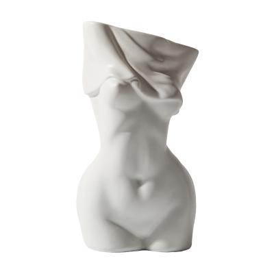 China 2022 Traditional Nordic modern color human body shape ceramic white flower vase for home decoration for sale