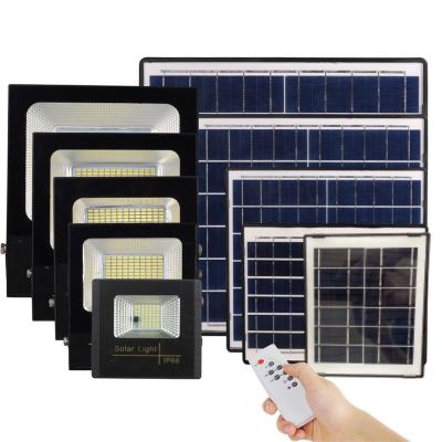 China Light Control + Ip66 Remote Control Plastic Waterproof Outdoor Floodlight 30W 60W 100W 200W Led Solar Flood Light for sale