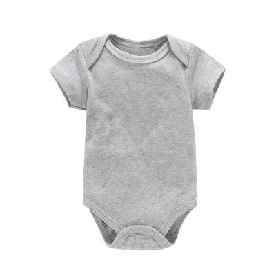 China Relaxation Wholesale baby plain clothes for newborns 0-1 year old solid color onesie boys and girls baby short summer climb for sale