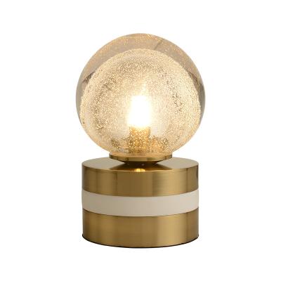 China Modern Creative Marble Stone Modern Metal Marble Metal Living Room Bedroom Globe Ball Gold Table Low Glass Lamp for sale