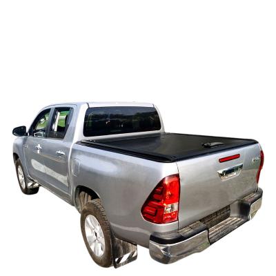 China Modern New Listing Hard Soft Roll Lid Tonneau Retractable Cover For Toyota Hilax for sale