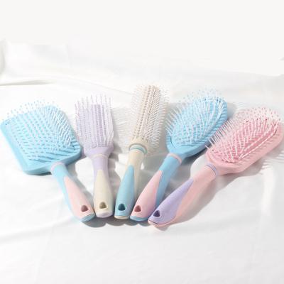 China Hot Waterproof ABS Plastic Detangling Girls Hair Brush Long Handle Pink Purple Hair Brush Shapes TPR Hair Bristle Multi Soft Comb Large Paddle for sale