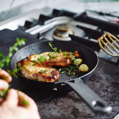 China Sustainable Cook Black Wok Carbon Steel Healthy Non Stick Frying Pan for sale