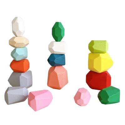 China Eco-friendly Material Kids Toy Educational Educational Games Wooden Rainbow Laminated Stone Blocks for sale