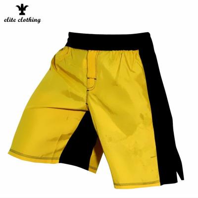 China Custom 100% Polyester Mens Black And Yellow Muttahida Majlis-e-Amal Boxing Shorts OEM Service for sale