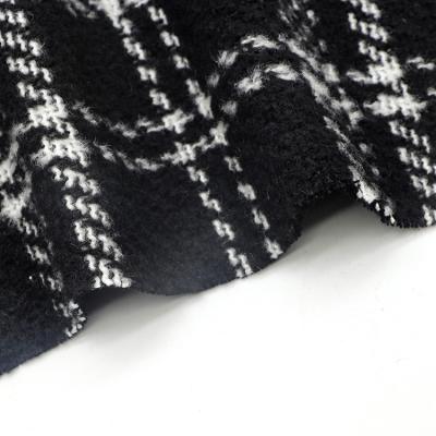 China Polyester Organic Tweed Black White Yarn Dyed Woven Woolen Fabric For Coat Vest Suit for sale