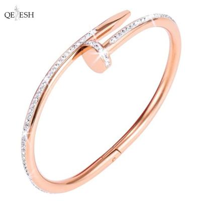 China Qetesh Hip Hop Stainless Steel Viable Adjustable Nail Form Fashion Bangle Jewelry Couples Metal Bracelet for sale