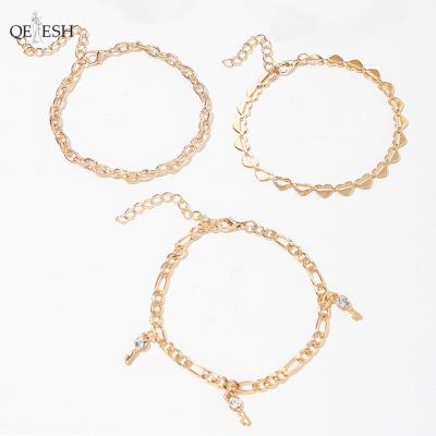 China Qetesh Snake Shaped Chain New Love Viable Hollow Disc Anklet With Diamond Key Tassel Gold Plated Cuban Link Dancing Anklets for sale