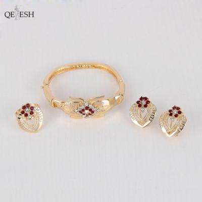 China Qetesh Four-Piece Alloy Viable Necklace Earrings High-End Simple Ring And Bracelet Jewelry Set Dubai Gold Necklace Dangle for sale