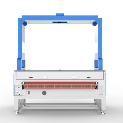 China Apparel and fashion laser cutter machine for fabric garment industry en venta