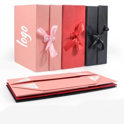 China Custom Recyclable Matte Black Large Rigid Paper Cardboard Hair Extension Packaging Box Wig Box Design Custom Gift Packaging Box for sale