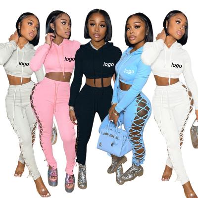 China Wholesale 2022 new arrivals factory fashion QUICK DRY bandage solid pencil pants cover hollow sweater women's tracksuit two-piece set for sale