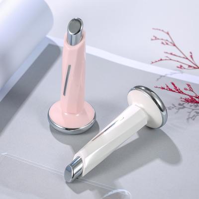 China 2021 Dark Circles Vibration Heating Electric Cordless Eye Beauty Equipment And Lip Care Device for sale