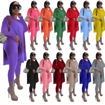 China Autumn 2021 medium length long sleeve round collar suit QUICK DRY solid color split two piece set long sleeve pantsuit for sale